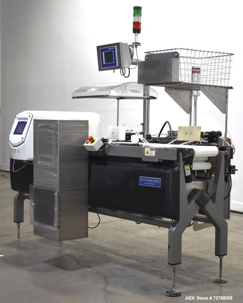 Used Mettler-Toledo Safeline Hi-Speed Model XE Combination Metal Detector and Checkweigher. Capable of speeds up to 500 packages per minute. Capable of weighing product up to 7kg. Approximate 7-3/4" ...
